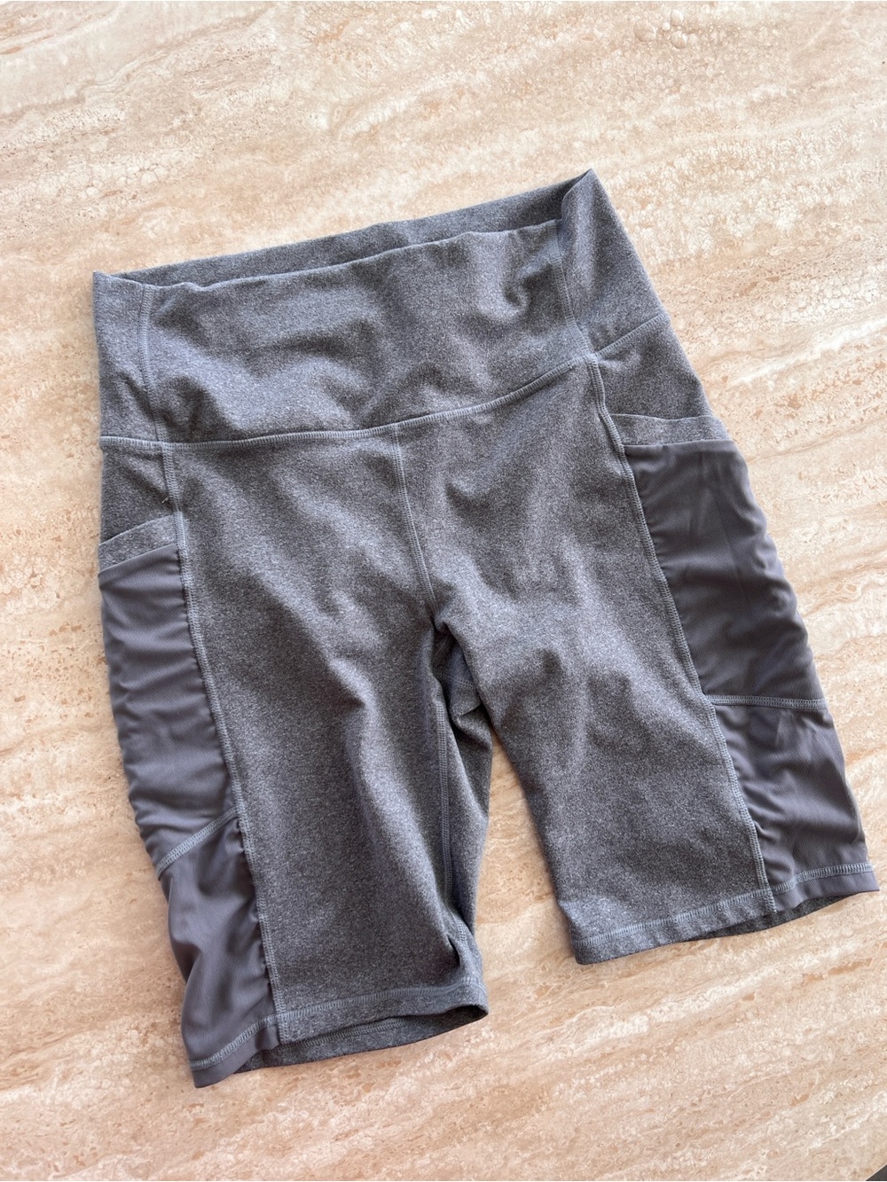 Fabletics High-Waist Gray Women’s Performance Bike Shorts with pockets